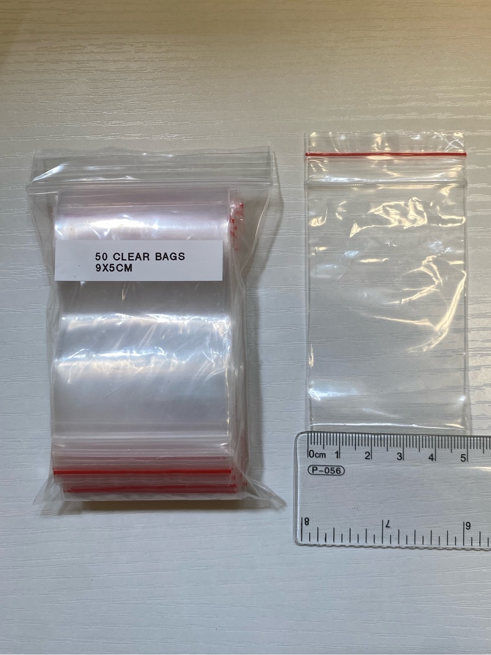 Clear 9x5cm Resealable Plastic Bags with Red Zip - Pack of 50